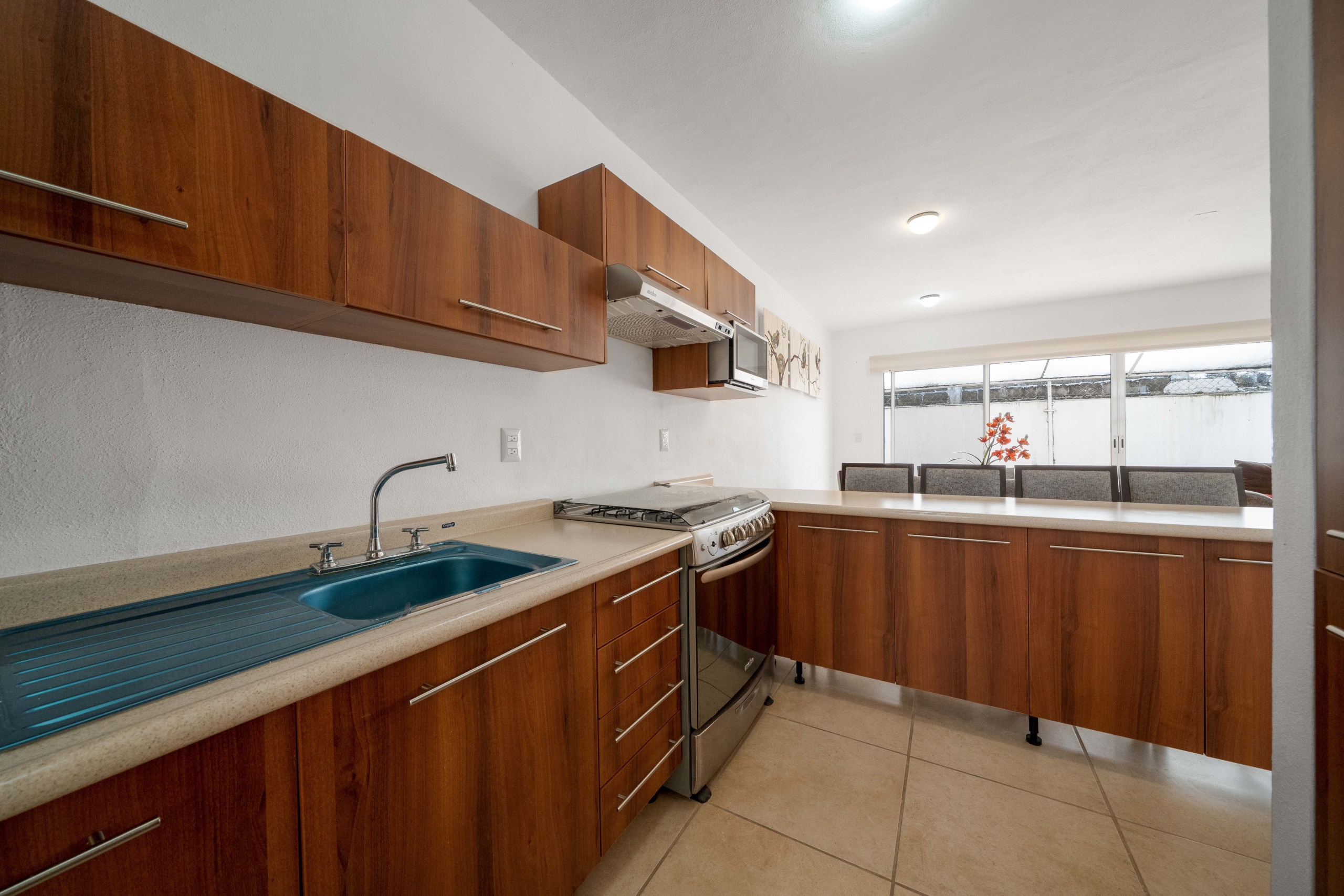 Casa en venta en Las Ceibas, Nuevo Vallarta. 3 recámaras, 3 baños, cochera techada en residencial con seguridad. Ubicación estratégica en Bahía de Banderas. Cocina