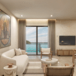 Sala con vista al mar de Nukma Beachfront Life, un proyecto en preventa con departamentos en venta en La Peñita de Jaltemba.