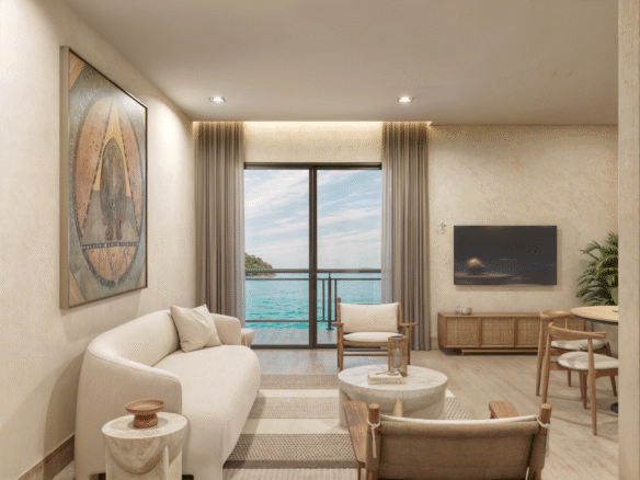 Sala con vista al mar de Nukma Beachfront Life, un proyecto en preventa con departamentos en venta en La Peñita de Jaltemba.